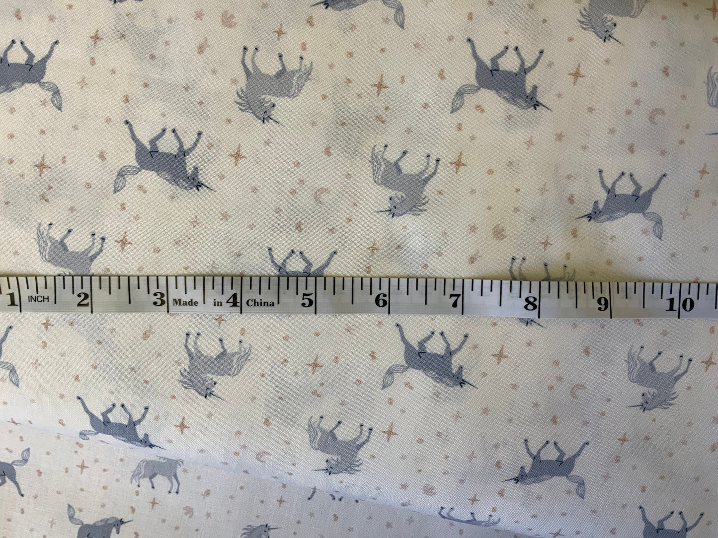 unicorn-baby-girl-fabric-dear-stella-white-cotton