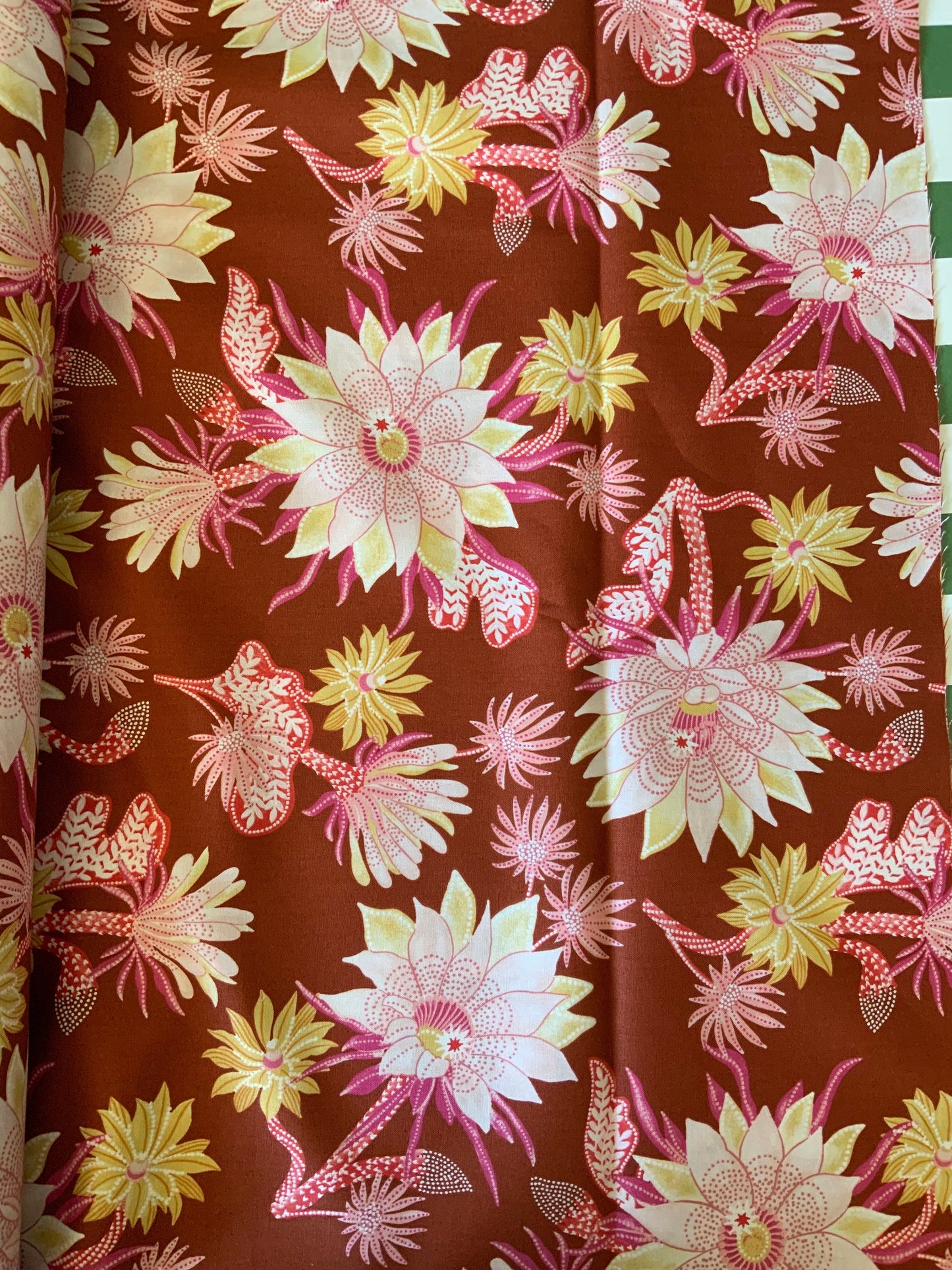 Desert sunrise 90855-32 Rust FIGO FABRICS Flower design with orange, pink, yellow