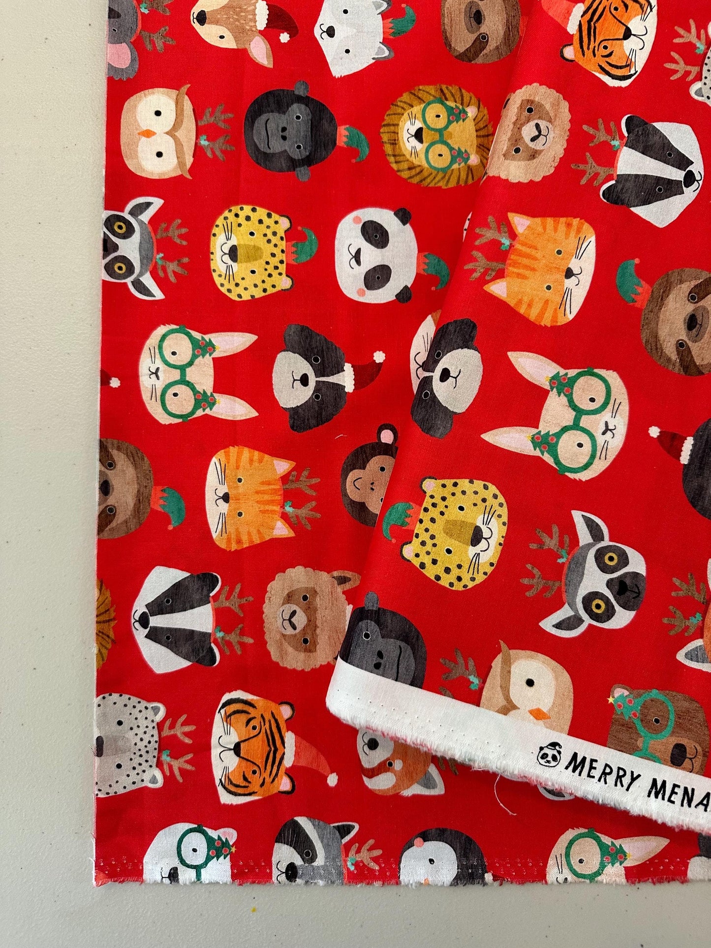 christmas-animal-fabric-festive-party-animals-on-red-cotton