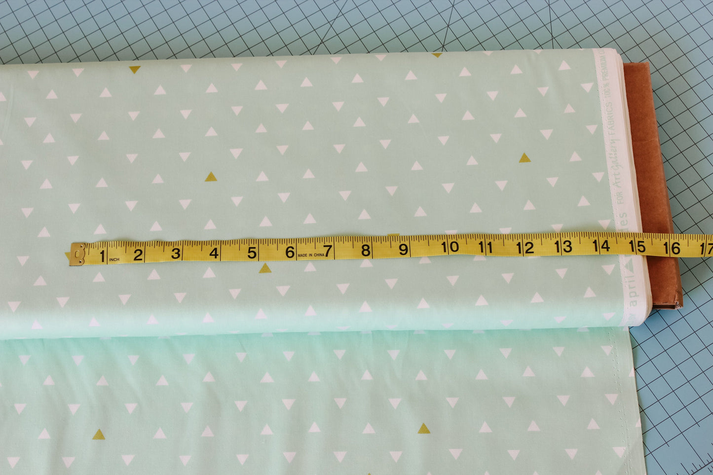 mint-fabric-by-the-yard-white-and-gold-triangle-on-mint-100-cotton-fabric-quilting-fabric-geo-fabric-baby-quilt-tribal-woodland-arz-554