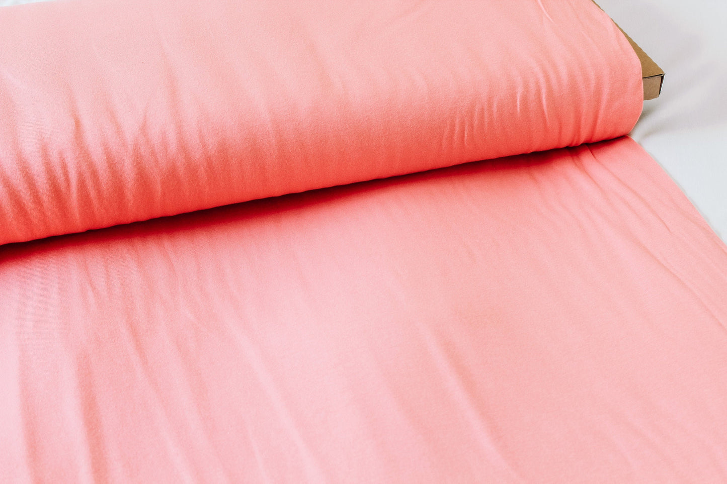 solid-coral-knit-fabric-art-gallery-fabrics-jersey-knit-coral-light-pink-jersey-knit-fabrics