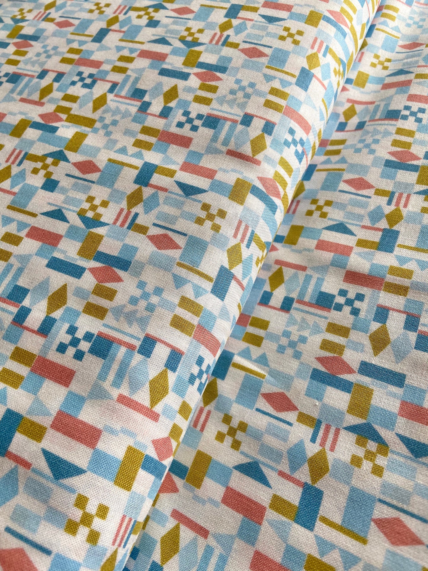 geometric-quilting-cotton-fabric-blue-pink-mustard-figo-rollakan