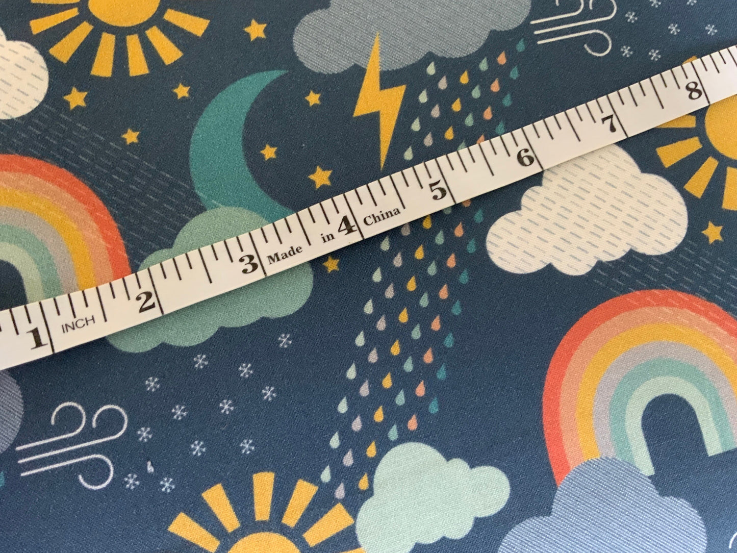 play-1981-dashwood-studios-bright-spring-fabric-rainbow-in-the-storm-blue