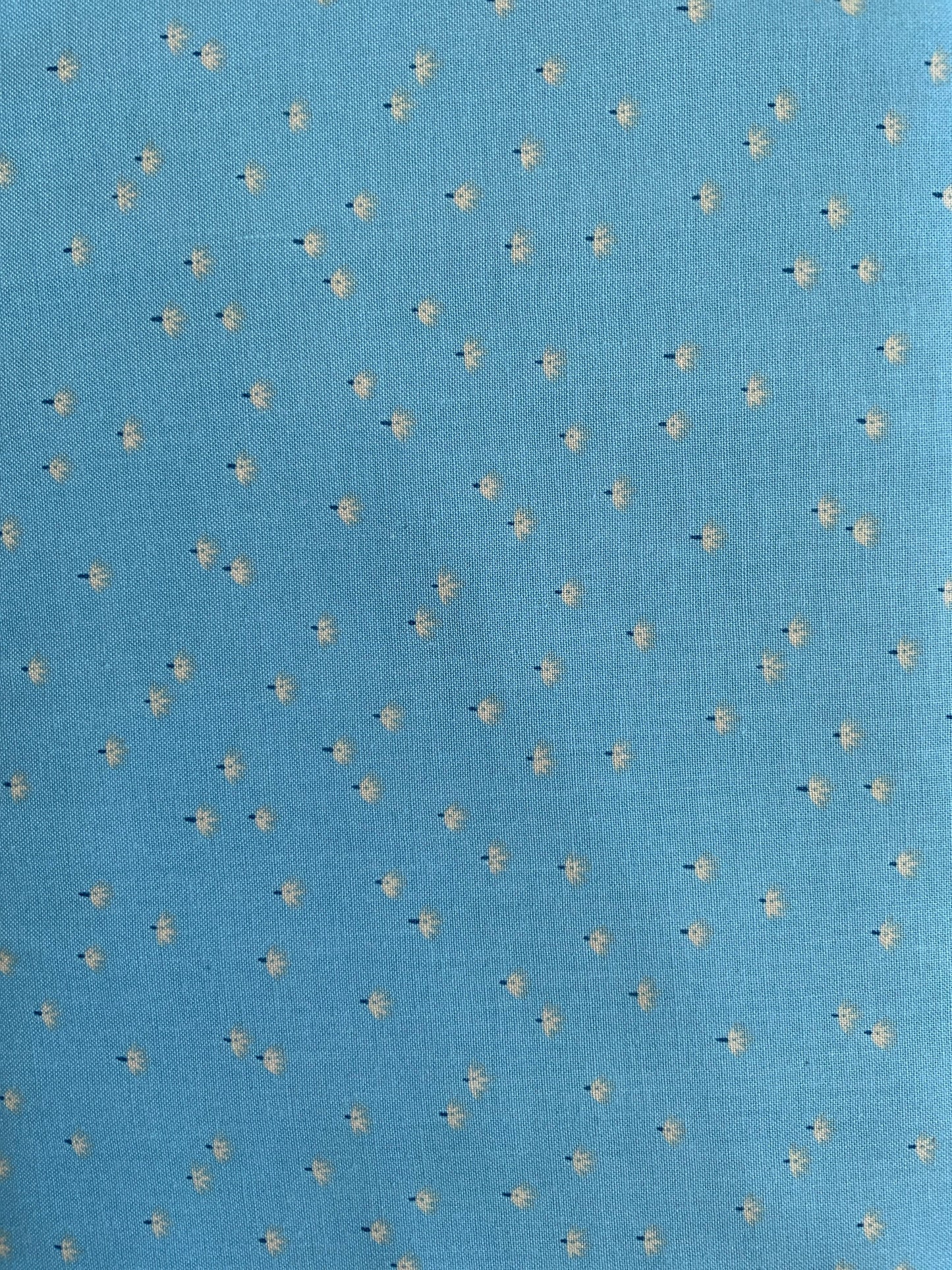 light-blue-floral-cotton-fabric-ditsy-mini-floral-design