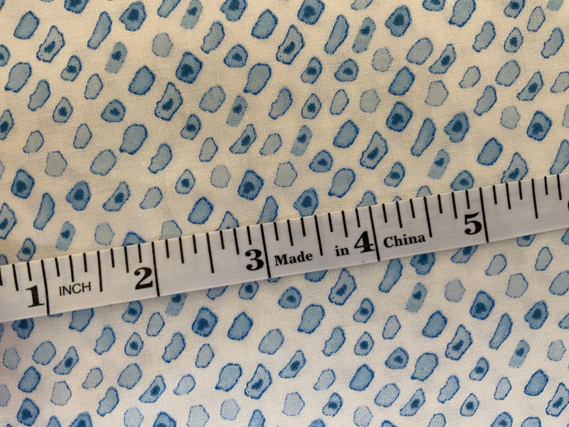 The rain in Spain TG104-MS4 light blue spring pocadot cotton and steel dotted blue