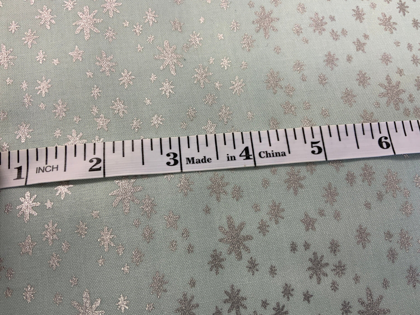 rifle-paper-co-christmas-fabric-silver-blue-holiday-stars