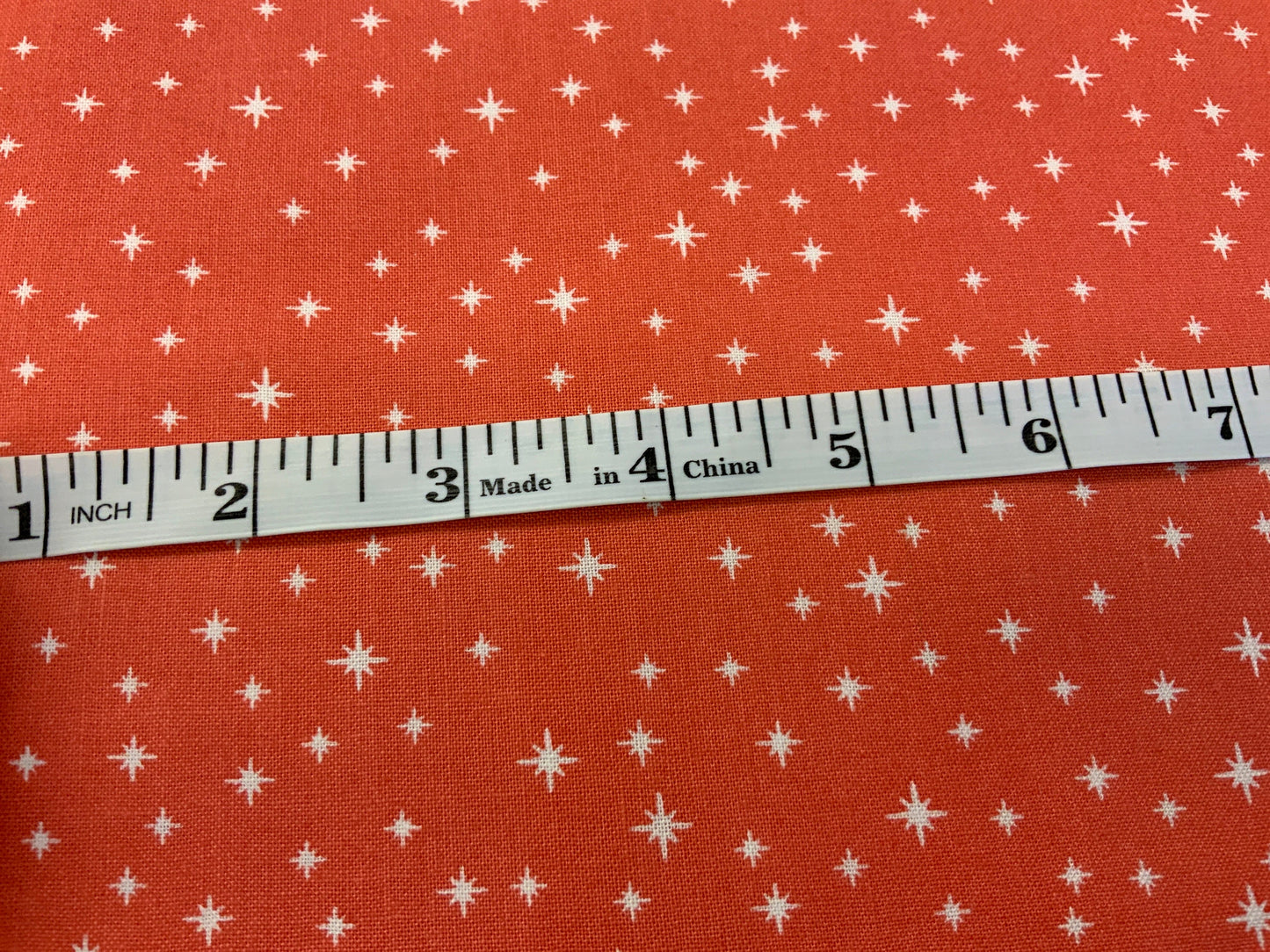 starry-christmas-fabric-red-holiday-cotton-44-wide