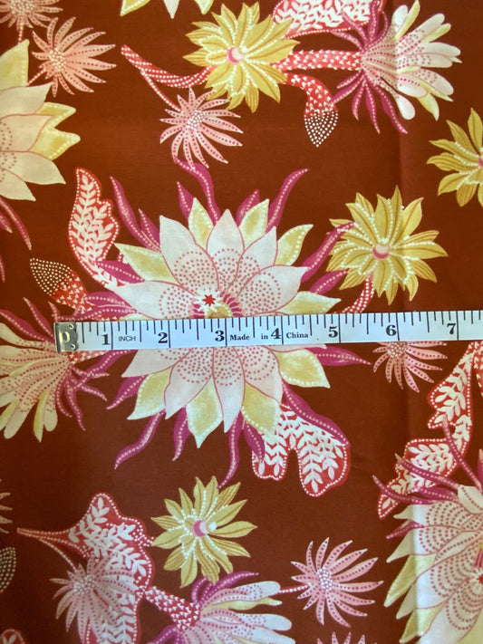 Desert sunrise 90855-32 Rust FIGO FABRICS Flower design with orange, pink, yellow