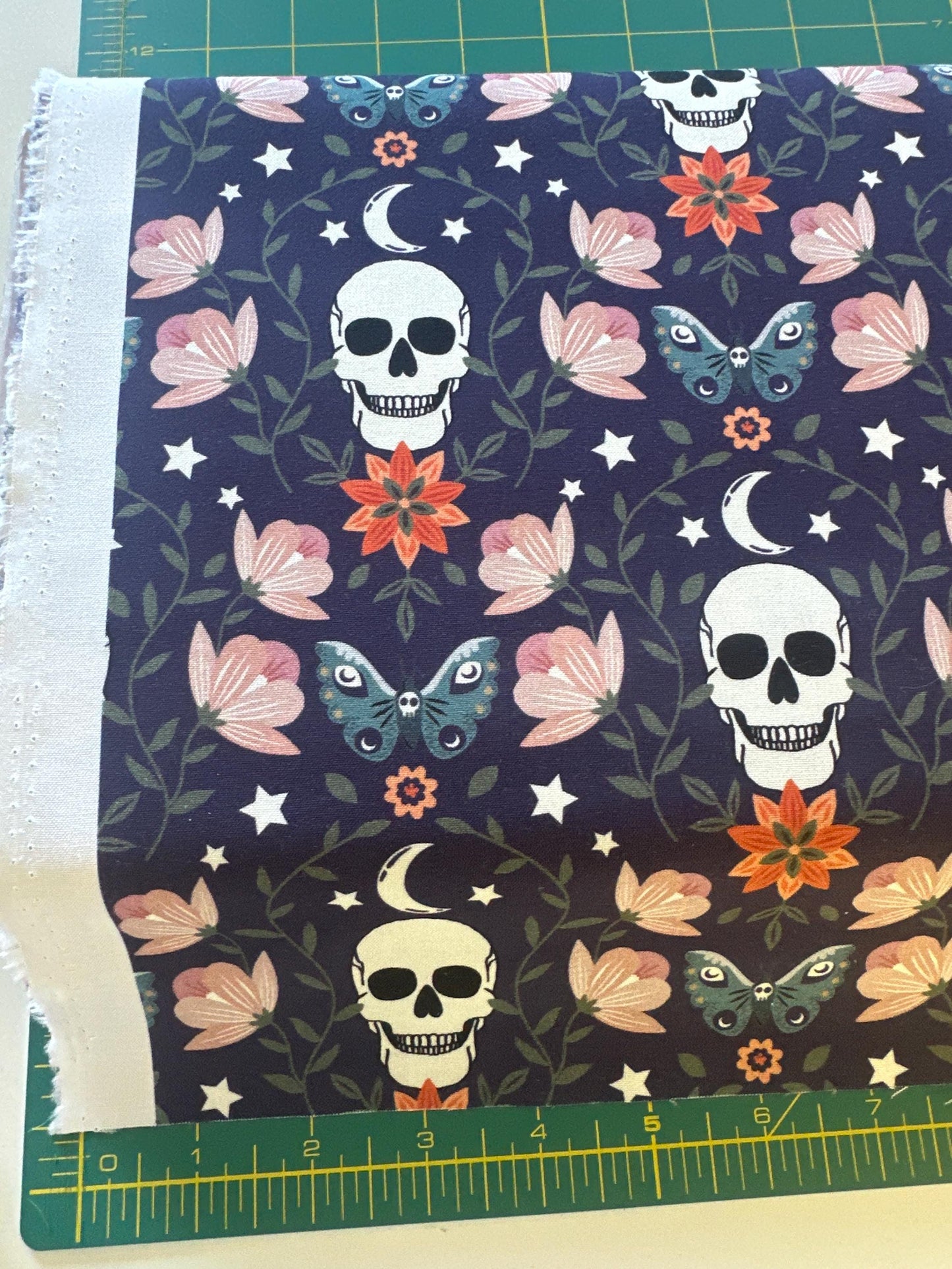 halloween-skulls-cotton-fabric-purple-floral-spiderweb-print