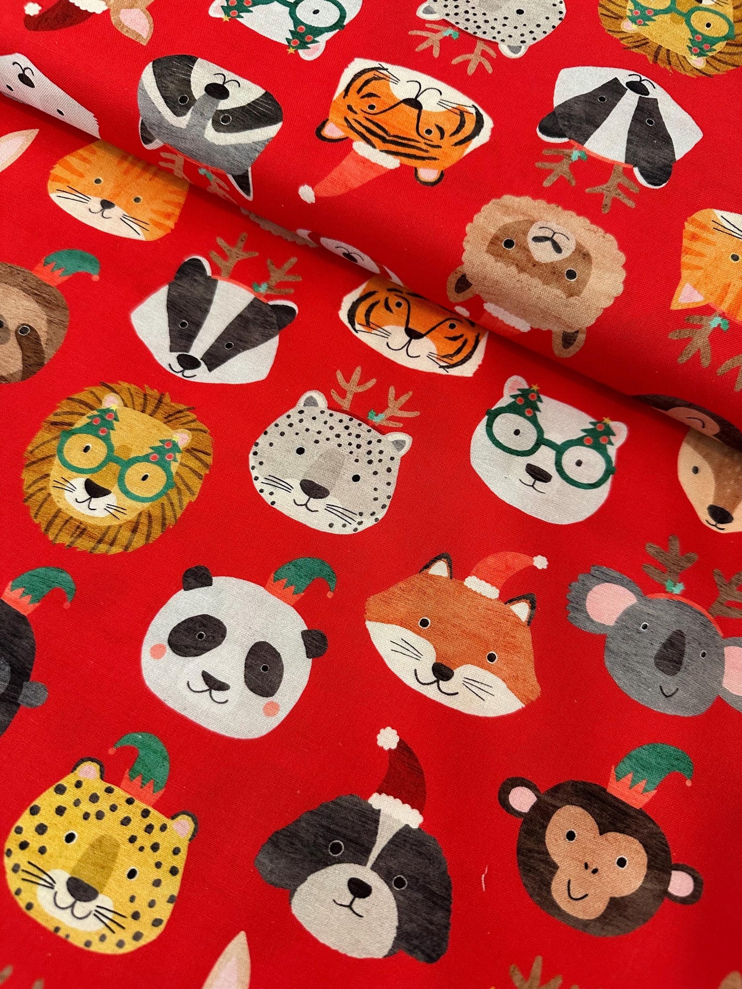 christmas-animal-fabric-festive-party-animals-on-red-cotton