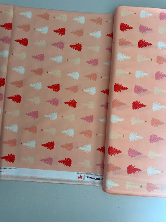 christmas-in-the-city-christmastime-joy-holiday-trees-pink-trees-on-peach