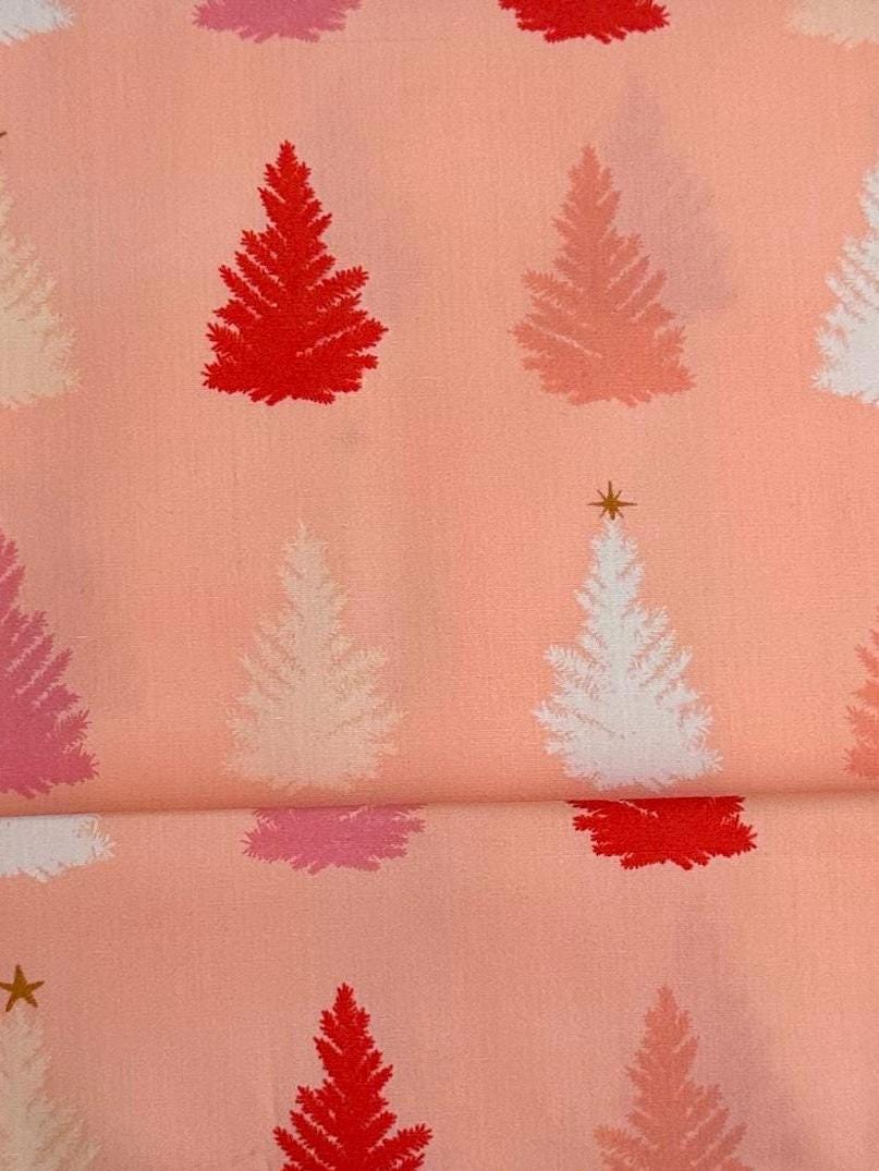 christmas-in-the-city-christmastime-joy-holiday-trees-pink-trees-on-peach